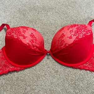 Victoria’s Secret bright red bra with lace accents and rhinestones. 36 C